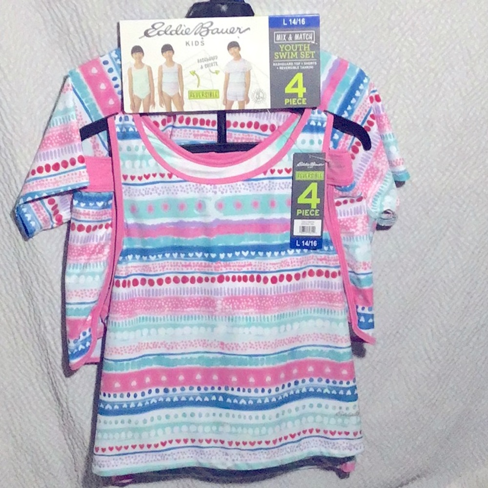 swim suite one bikini bottom one bikini top. one swim short one swim T shirt.